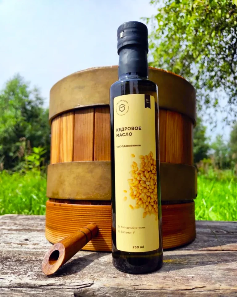 250ml bottle of siberian cedar oil with wooden press Ringing Cedars of Russia USA + Canada | Anastasia Foundation
